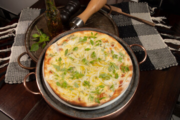 Brazilian style pizza with mozzarella, cheese, onion