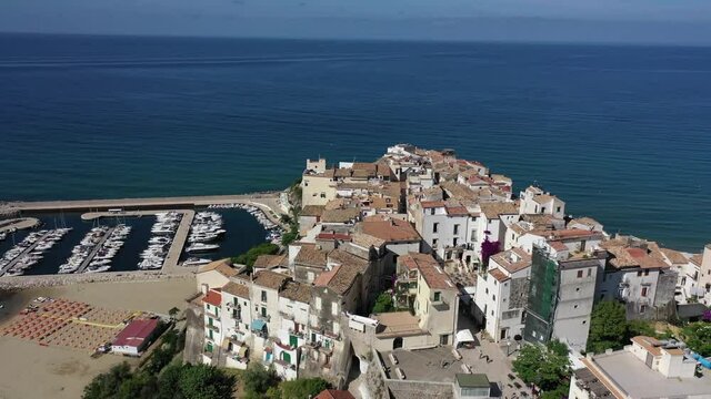 Riviera of Ulysses. The village of Sperlonga, perched on the rock. Aerial shot with drone of the bays, the sea and the beaches.