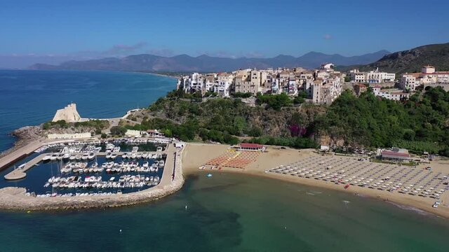 Riviera of Ulysses. The village of Sperlonga, perched on the rock. Aerial shot with drone of the bays, the sea and the beaches.