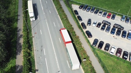 Aerial view of trucks unloading in logostics center