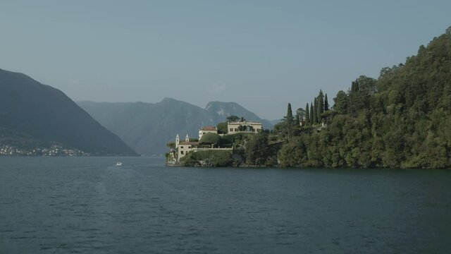 Aerial Drone Footage View Of Balbianello manor house in Como’s lakes, Lecco lake, House on bay ,in Lombardia Italy Europe Alps // no video editing
