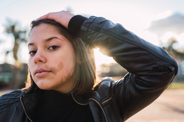 Portrait of beautiful latin teenager in the sunset.