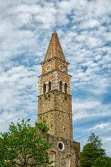 Fototapeta na wymiar Portoroz old church tower “Cerkev sv Bernardina” cloudy weather HDR in Slovenia Europe