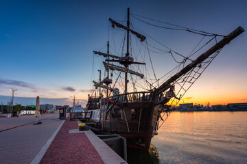 Harbor in Gdynia with the pirate ship at sunset. Poland