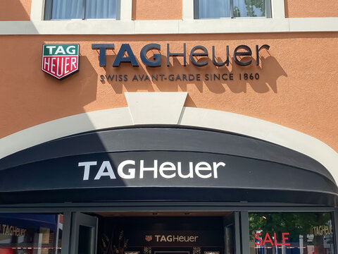 Roermond, Netherlands - July 1. 2021: View on store facade with logo lettering of tag heuer swiss luxury watches comany