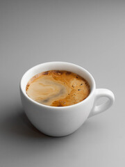 Delicious hot double shot of coffee in a white beautiful cup