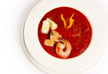 Red Mediterranean tomato soup with sea food