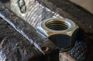 The nut is squeezed into the grip.