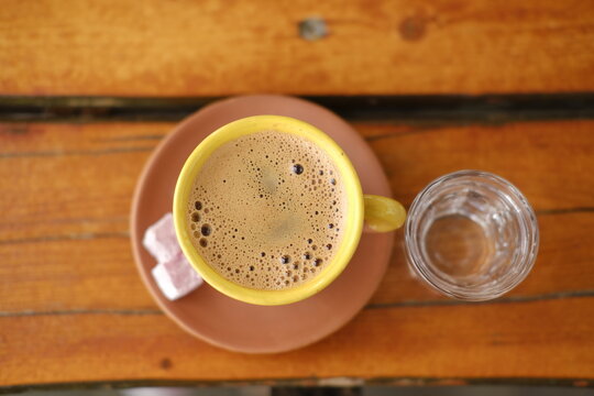 Cup of Turkish Coffee on wooden table