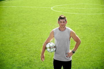 Male soccer player with a ball