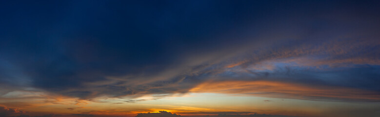 Naklejka na ściany i meble white clouds in the sky at sunset