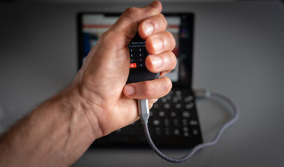 Hand holding device for security access