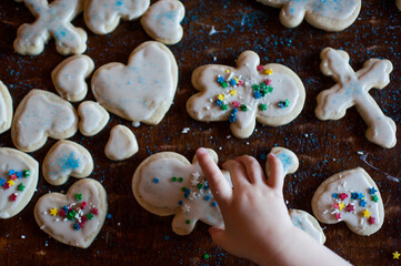 Fototapeta na wymiar Child Holding Christmas Cookies 