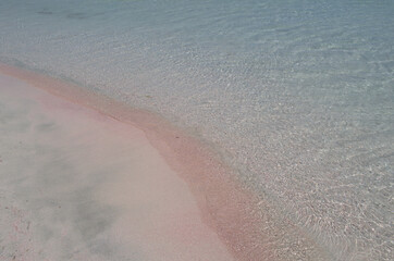Fototapeta na wymiar Sandy beach Elafonisi in Greece with pink sand and crystal clear waters.