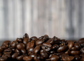 Coffee beans are not black textured background.