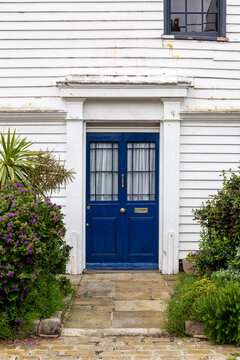 The front door and entrance to an old British home from the 1600's that was made from wood
