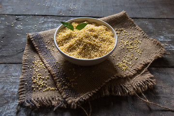Close up of moong dal or yellow lentils food background. Selective focus.