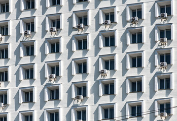 Old Soviet architecture. Straight lines and gray hotel building Soviet in Kolomna, Russia