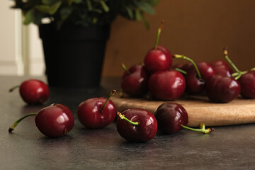 ripe cherries on a dark background