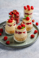 Homemade raspberry trifles on a light background.