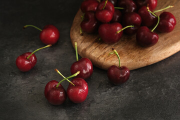 ripe cherries on a dark background