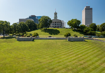 Aerial drone view of the Tennessee state capitol building in Nashville with the business district