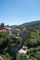 Fototapeta na wymiar Aerial view of Puentedey on a sunny day, a beautiful village in Burgos, Merindades, Spain, Europe