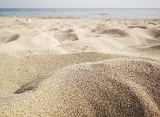 Sand on the beach and sea view.  Nature background with empty copy space. Minimalist backdrop