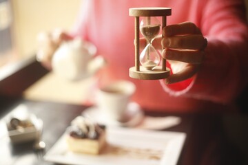 hourglass in hand