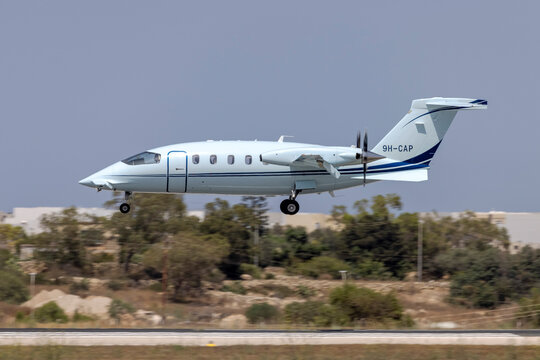 Luqa, Malta - July 8, 2021: JMC Flight Investments Piaggio P180 Avanti II (Reg: 9H-CAP) landing runway 31.