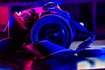Fototapeta na wymiar Mirrorless cameras with neon lights 