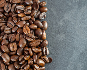 Coffee beans are not black textured background.