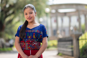 Portrait of a beautiful young woman looking at the camera in Quetzaltenango Park.