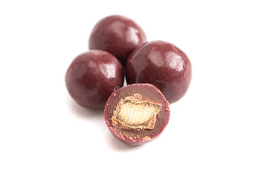 Dark Red Coated Chocolate Covered Dried Fruit on a White Background