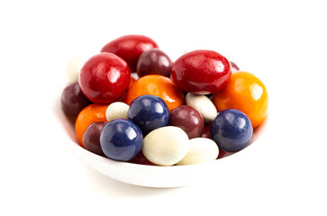 A Mix of Candy Coated Chocolate Covered Dried Fruit Isolated on a White Background