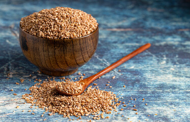 Bowl Bulgur Wheat on a Rustic Blue Table