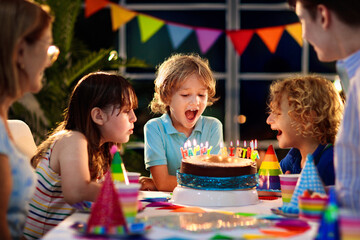 Child birthday party cake. Family with kids.