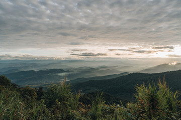 Fototapeta na wymiar Sunset in the Mountains at Doi Pui Viewpoint Doi Suthep-Pui National Park Chiang Mai