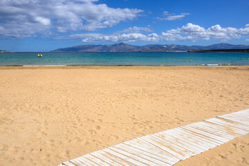 Fototapeta na wymiar Santa Maria beach with crystal clear water and soft sand. Paros island, Cyclades, Greece