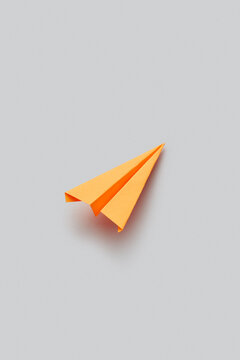 One orange paperplane