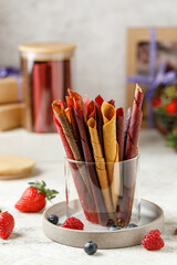 Fruit marshmallow. Berry pastille on light background. Pastille and fruit chips, frips