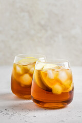 Apple iced tea in glasses. Space ofr text.
