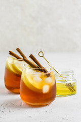 Apple honey iced tea in glasses. Space ofr text.