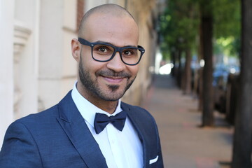 Elegant ethnic man wearing a tuxedo