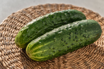 Fresh cucumbers on a wooden table