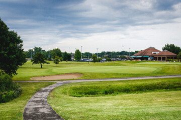 golf course on a sunny day looking at the golf holes