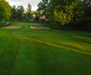 golf course on a sunny day looking at the golf holes