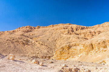 Fototapeta na wymiar A desert landscape in Egypt near Luxor town on a sunny day