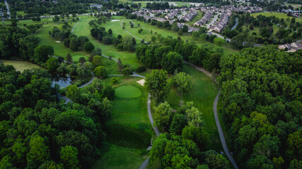 Fototapeta na wymiar Aerial view of golf course and golf holes