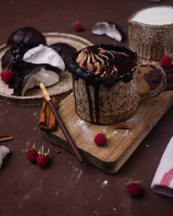 Hot chocolate and brownies on a beige background